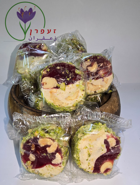 راحة بطعم الرمان والقشطة مغطاة بالفستق حلبي